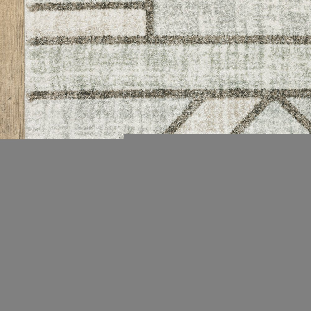 6' X 9' Gray And Ivory Geometric Power Loom Area Rug