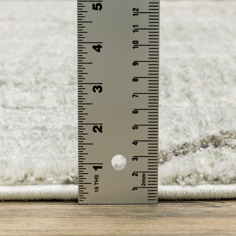 6' X 9' Gray And Ivory Geometric Power Loom Area Rug