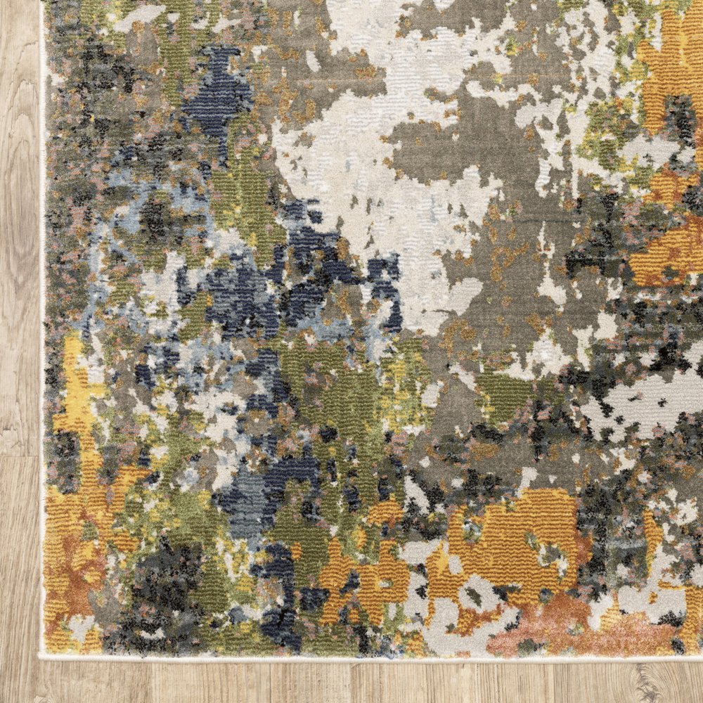 8' X 11' Beige Green And Orange Abstract Area Rug