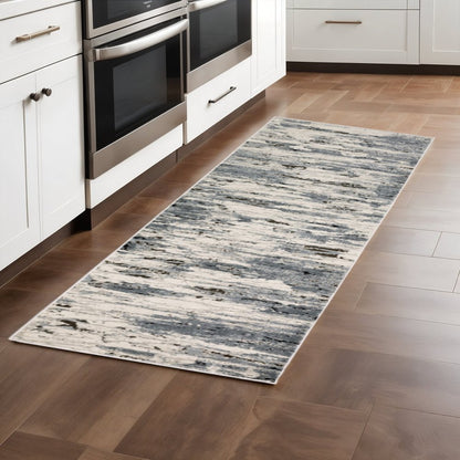 2' X 8' Blue Grey Beige And Brown Abstract Power Loom Stain Resistant Runner Rug