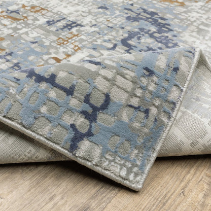 3' X 5' Blue Ivory Grey Brown Beige And Light Blue Abstract Power Loom Stain Resistant Area Rug