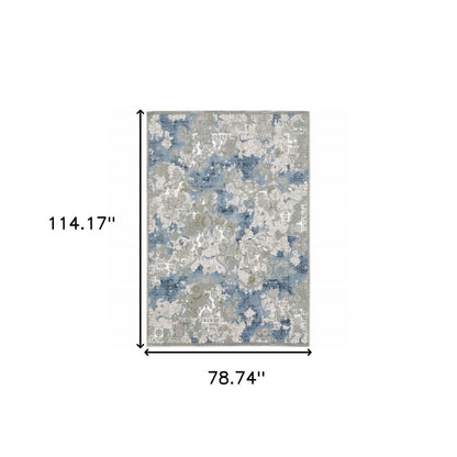 5' X 8' Grey Blue Ivory Navy Beige And Brown Abstract Power Loom Stain Resistant Area Rug