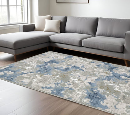 5' X 8' Grey Blue Ivory Navy Beige And Brown Abstract Power Loom Stain Resistant Area Rug