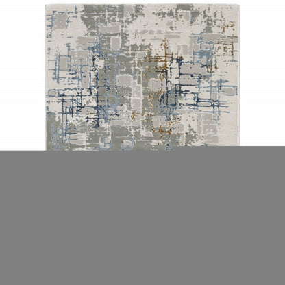 5' X 8' Grey Blue Brown Ivory And Deep Blue Abstract Power Loom Stain Resistant Area Rug
