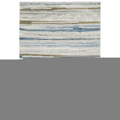 6' X 9' Grey Blue Ivory Brown Beige And Navy Abstract Power Loom Stain Resistant Area Rug