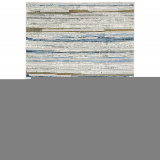 6' X 9' Grey Blue Ivory Brown Beige And Navy Abstract Power Loom Stain Resistant Area Rug