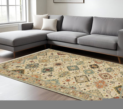 8' X 11' Beige Pale Blue Rust Gold Tan Brown And Orange Oriental Power Loom Stain Resistant Area Rug With Fringe