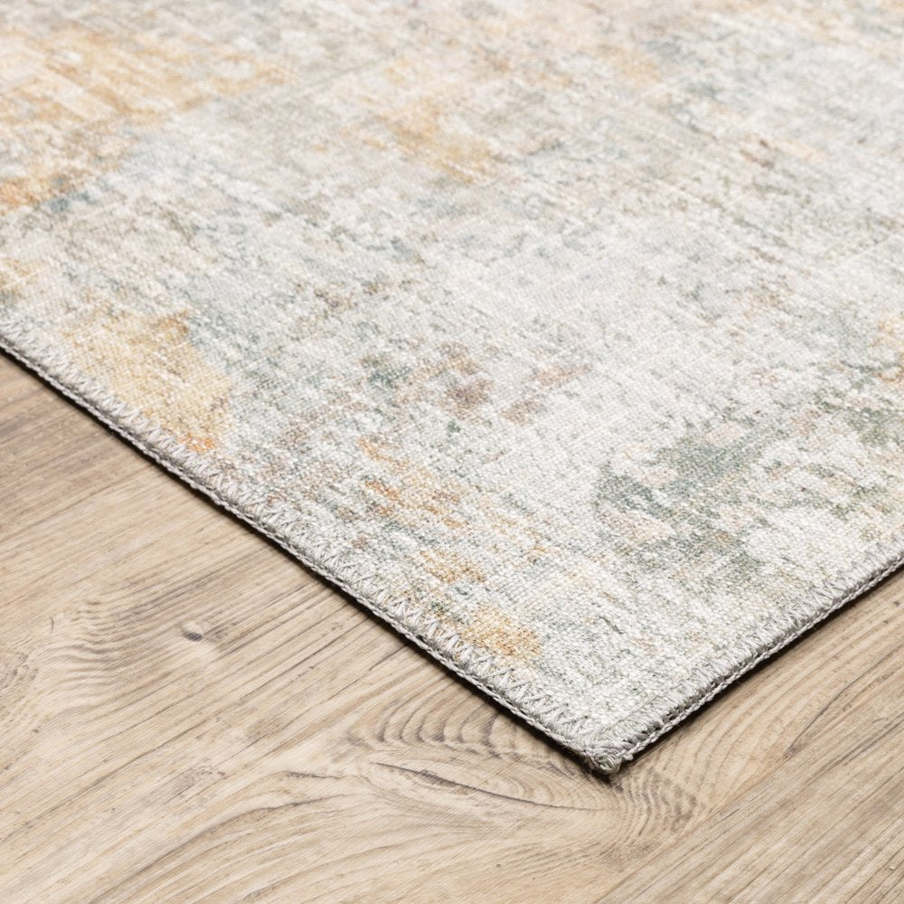 9' X 12' Yellow And Blue Abstract Area Rug