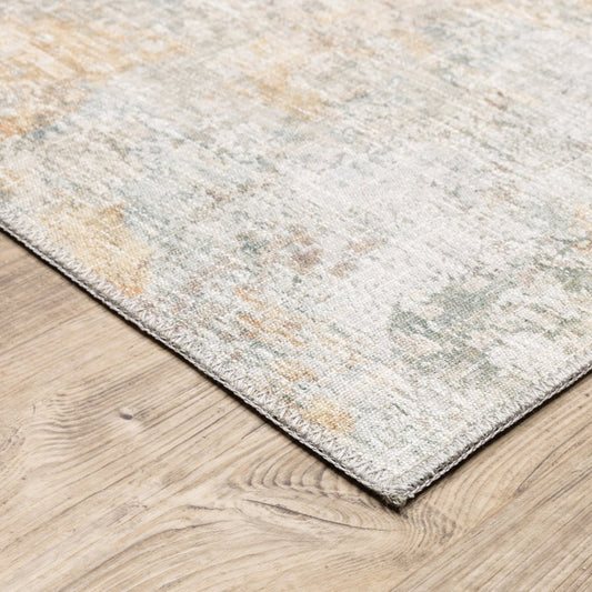 9' X 12' Yellow And Blue Abstract Area Rug