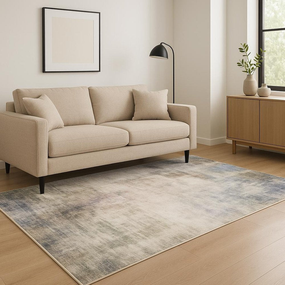 5' X 7' Beige Blue Grey Green Brown And Purple Abstract Power Loom Stain Resistant Area Rug