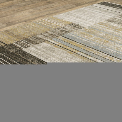 10' X 13' Beige Charcoal Brown Grey Tan Gold And Blue Geometric Power Loom Stain Resistant Area Rug With Fringe