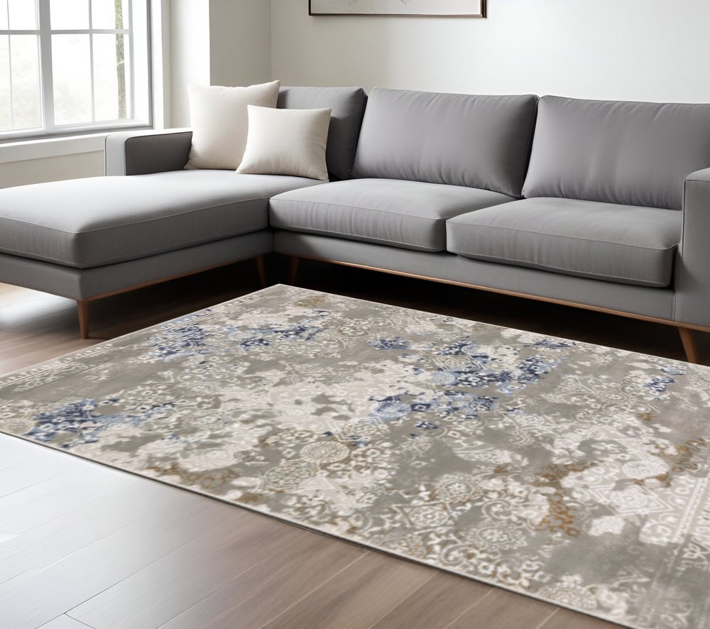 3' X 5' Grey Blue Ivory Brown And Navy Abstract Power Loom Stain Resistant Area Rug