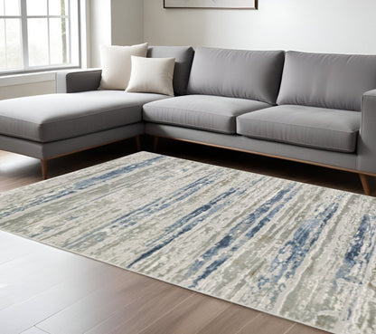 10' X 13' Blue Ivory Grey Light Blue And Brown Abstract Power Loom Stain Resistant Area Rug