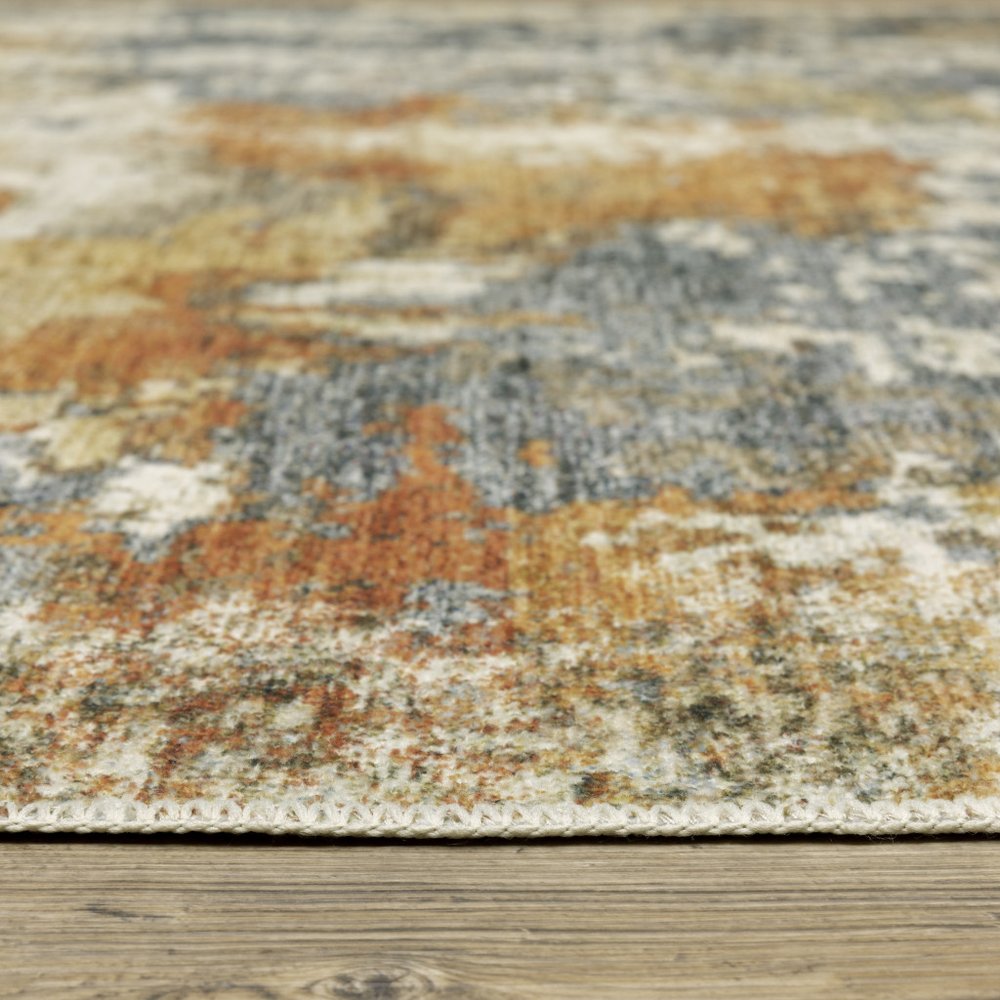 5' X 7' Teal Blue And Gold Abstract Distressed Area Rug
