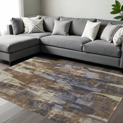 9' X 12' Brown Blue And Ivory Abstract Distressed Area Rug