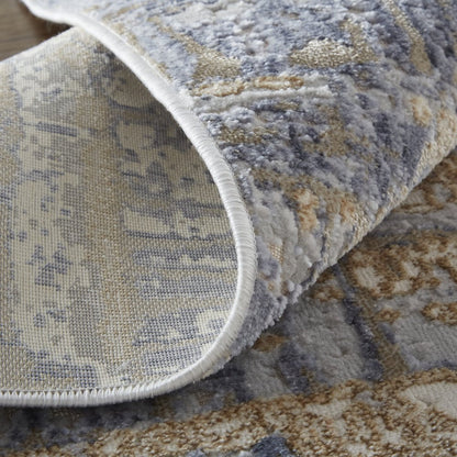 5' X 8' Tan And Blue Abstract Distressed Area Rug