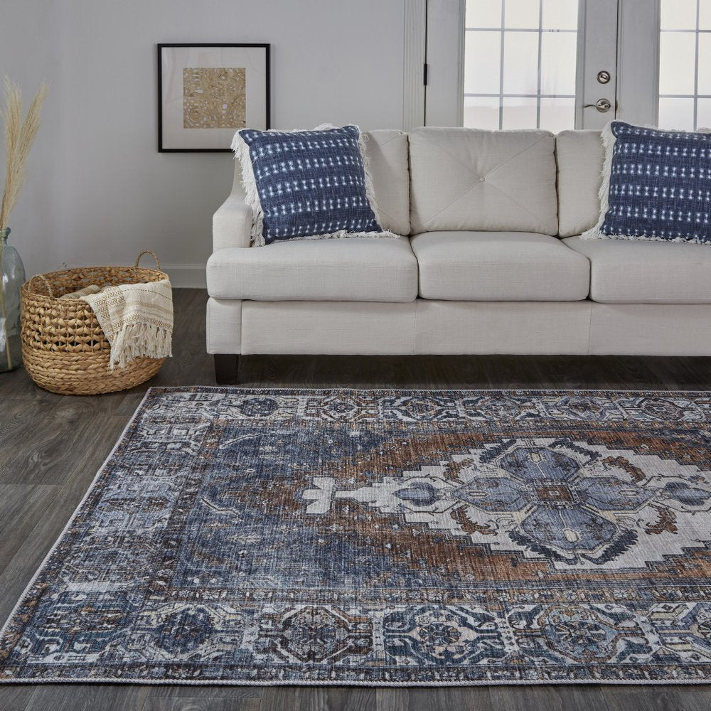 9' X 12' Blue And Ivory Floral Medallion Area Rug