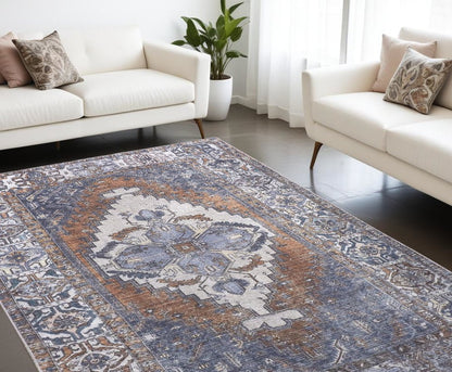 9' X 12' Blue And Ivory Floral Medallion Area Rug