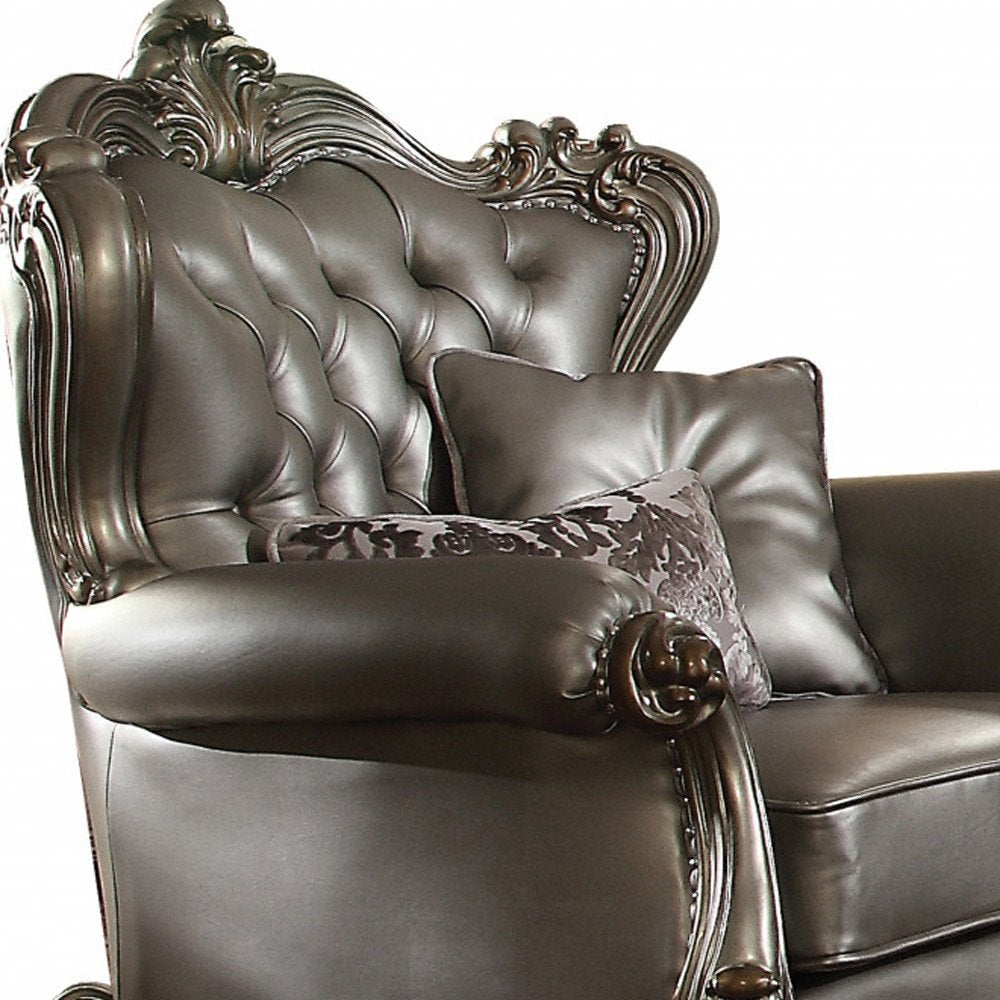 44" Silver and Platinum Faux Leather Tufted Wingback Chair And Toss Pillows