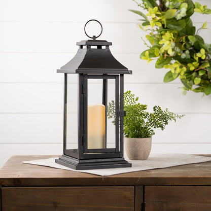 Set of Two Black Floor Lantern Candle Holders With Candles
