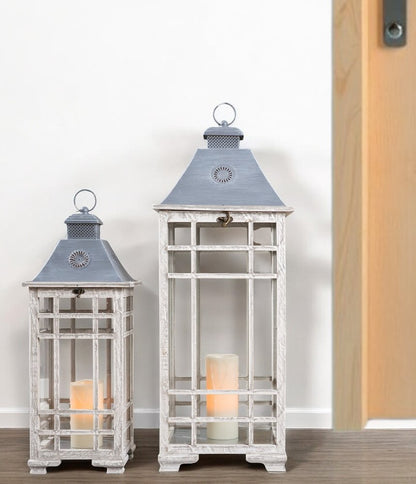 Set of Two White And Silver Distressed Geometric Metal Floor Lantern Candle Holders