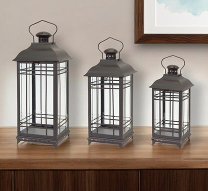 Set of Three Black Distressed Geometric Glass And Metal Floor Lantern Candle Holders