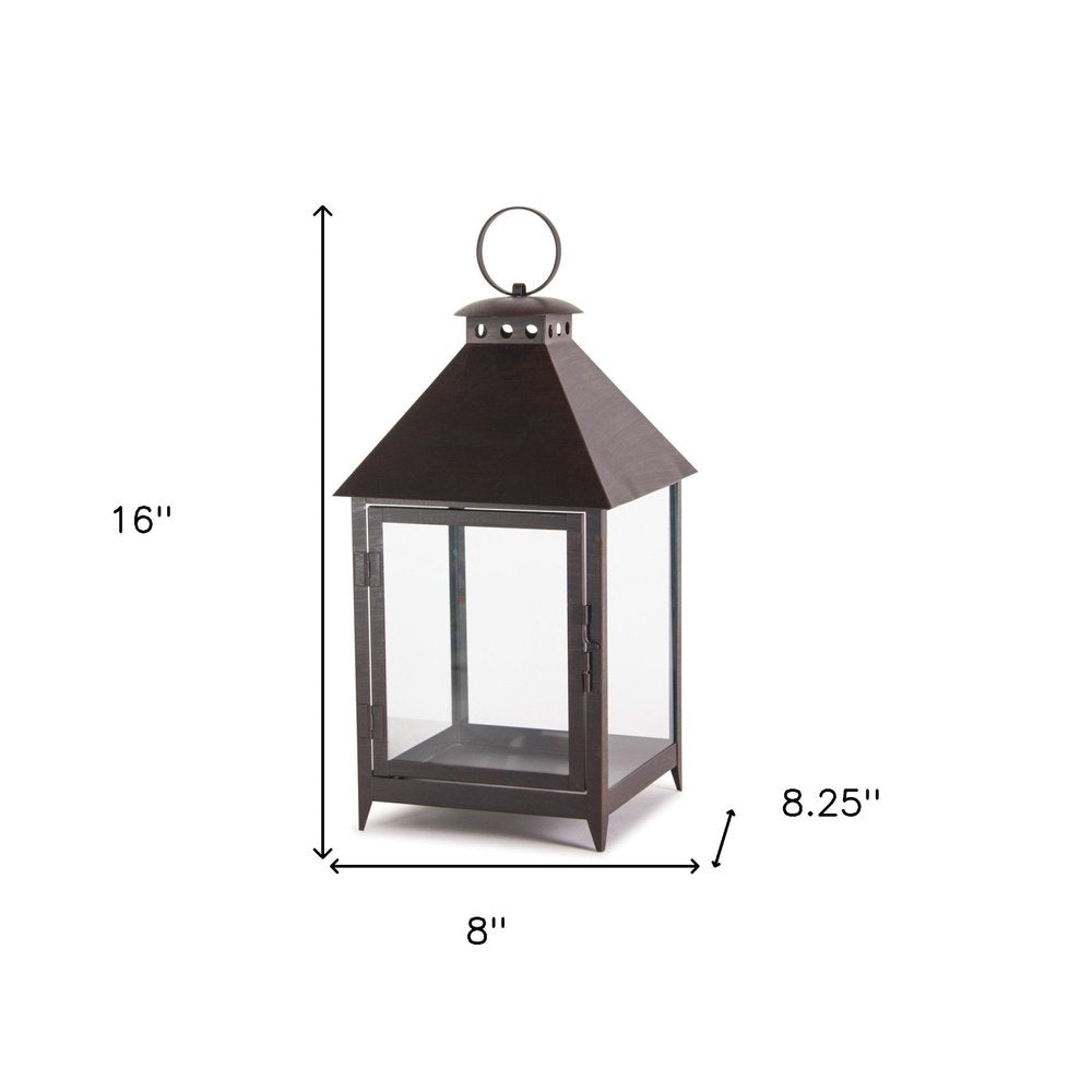 Set of Two Black Geometric Iron And Glass Floor Lantern Candle Holders