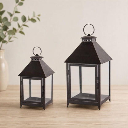 Set of Two Black Geometric Iron And Glass Floor Lantern Candle Holders