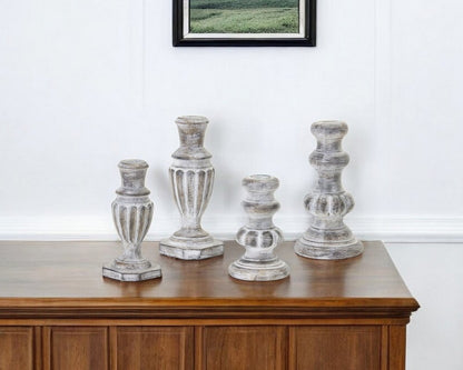 Set of Four White Washed Resin Tabletop Candle Sticks