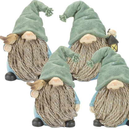 Set of Four Blue and Green Polyresin Christmas Figurine Tabletop Sculpture