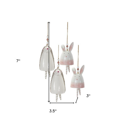 Set of Four 7" Pink And White Resin Hedgehog Model Bell Tabletop Sculpture