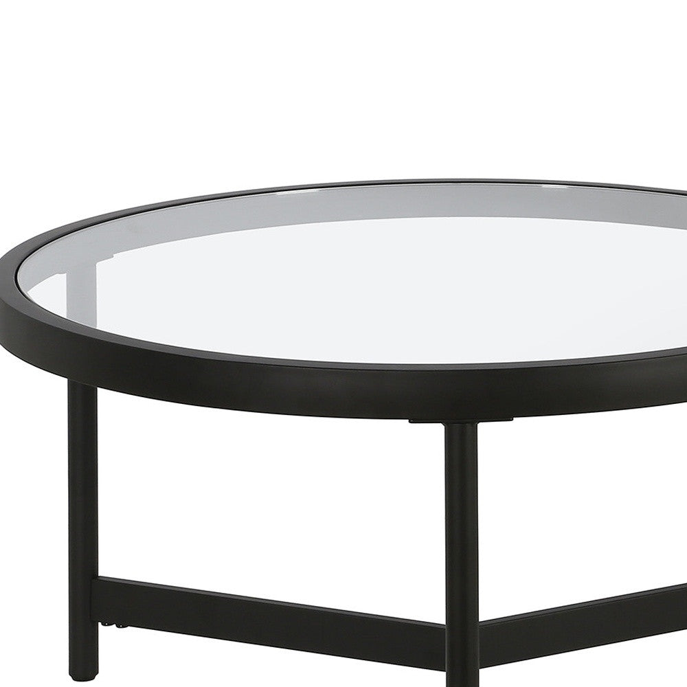 Set of Two 30" Black Glass And Steel Round Nested Coffee Tables