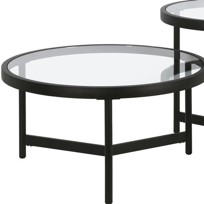 Set of Two 30" Black Glass And Steel Round Nested Coffee Tables