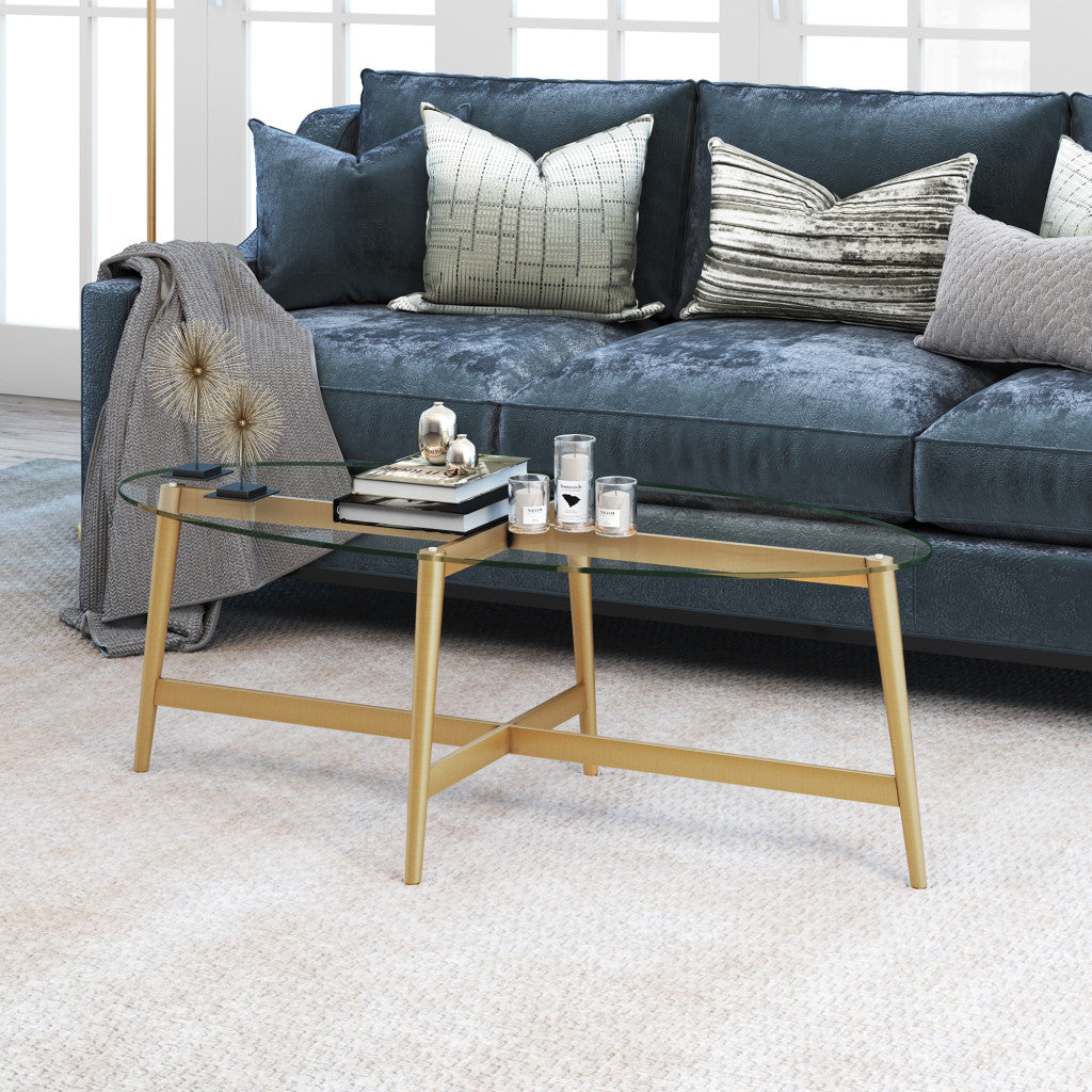 50" Clear And Gold Glass And Steel Oval Coffee Table
