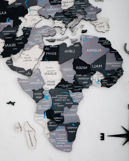 35" X 59" Black Gray and White Wood World Map Hanging Dimensional Sculpture