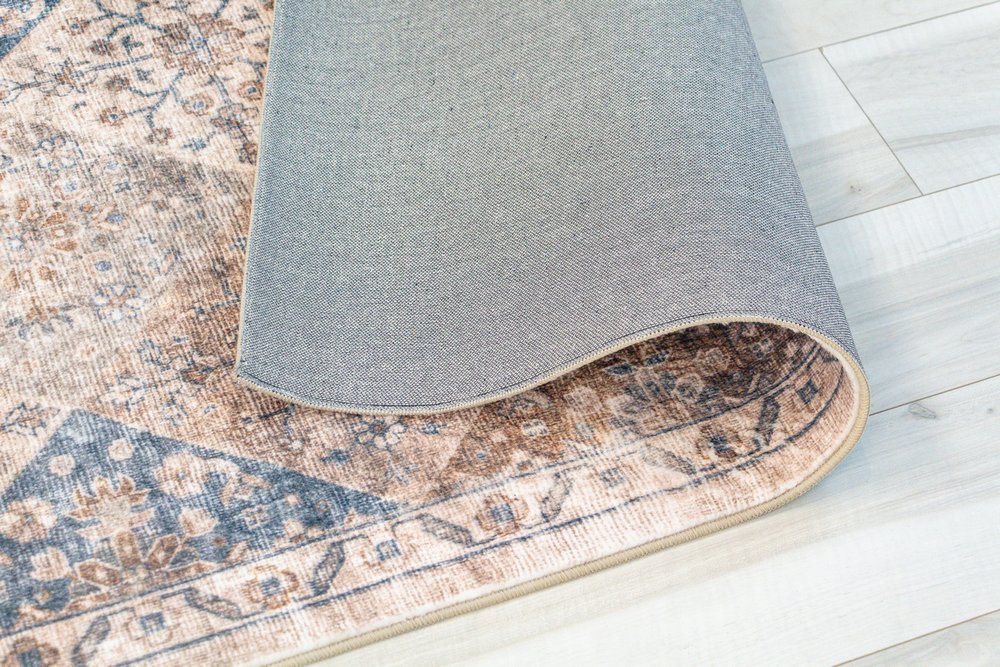 8' X 11' Brown and Blue Floral Distressed Area Rug