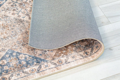 8' X 11' Brown and Blue Floral Distressed Area Rug