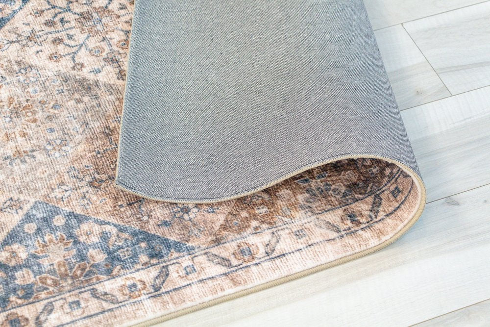 8' X 11' Brown and Blue Floral Distressed Area Rug