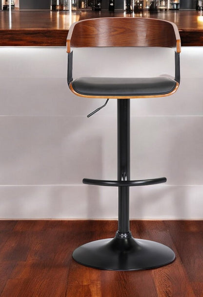 Black Faux Leather And Metal Swivel Adjustable Height Bar Chair