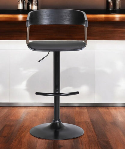 Black Faux Leather And Metal Swivel Adjustable Height Bar Chair