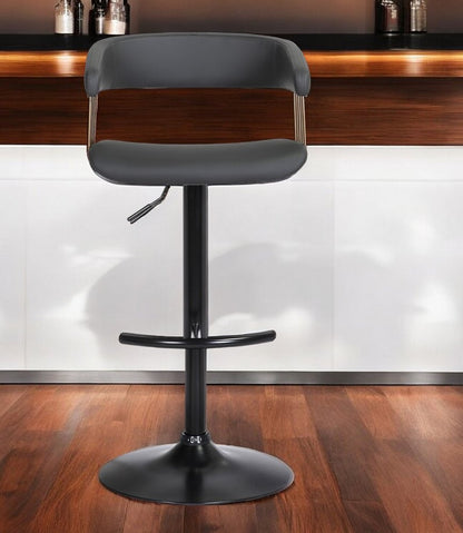 Black Faux Leather And Metal Swivel Adjustable Height Bar Chair