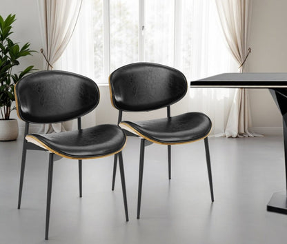 Set of Two Black Upholstered Faux Leather Curved Back Dining Side Chairs