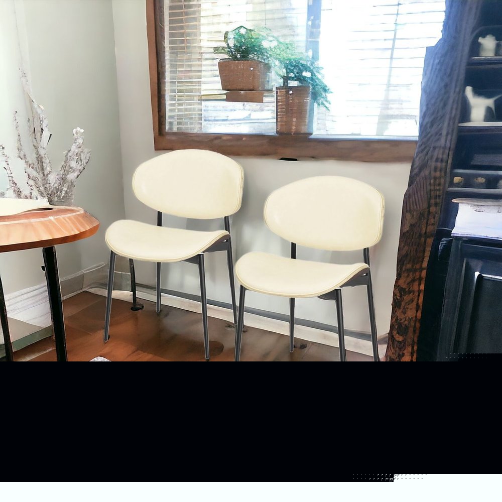 Set of Two Off White and Black Upholstered Faux Leather Curved Back Dining Side Chairs
