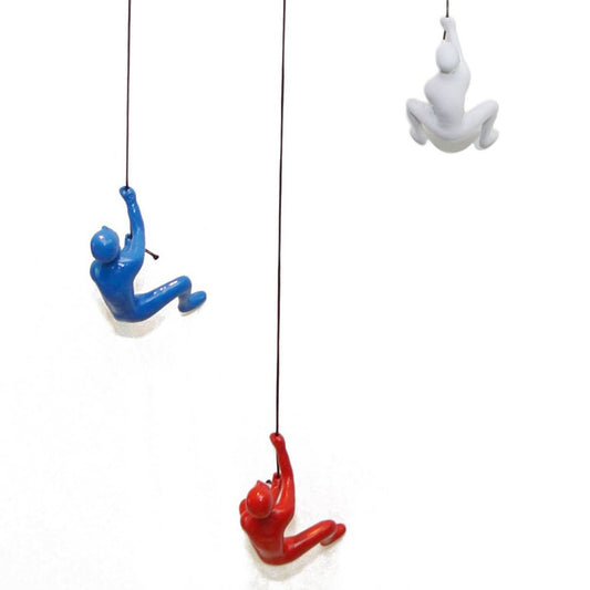 Set of Three Blue Red And White Resin Climbing Man Hanging Dimensional Sculpture