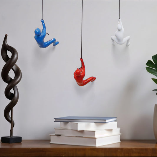 Set of Three Blue Red And White People Resin Novelty Hanging Dimensional Sculpture
