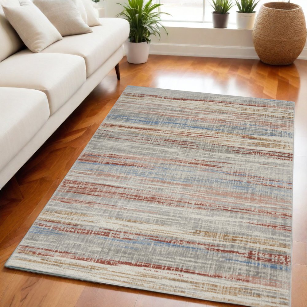 5' X 7' Ivory Blue and Brown Abstract Non Skid Area Rug
