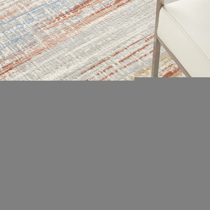 5' X 7' Ivory Blue and Brown Abstract Non Skid Area Rug