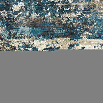 8' X 10' Beige Blue and Ivory Abstract Distressed Area Rug With Fringe