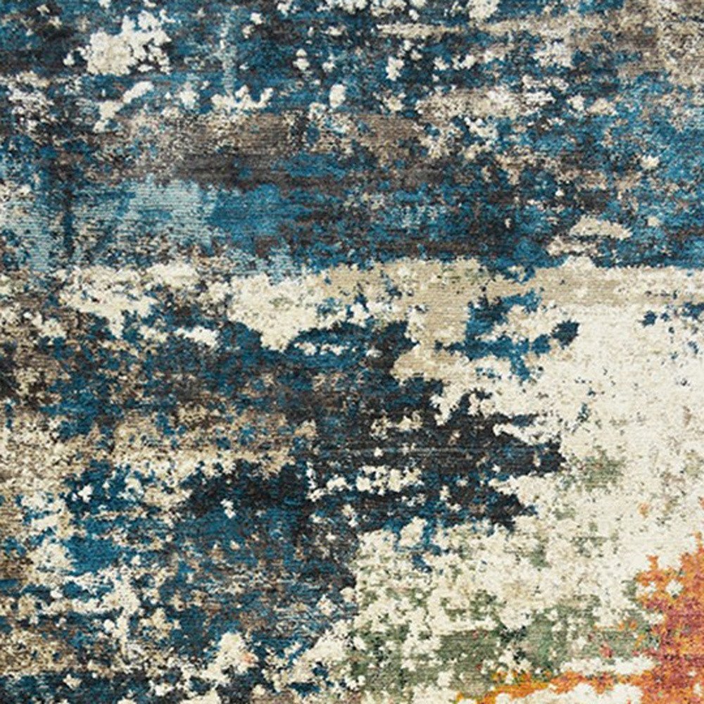 8' X 10' Beige Blue and Ivory Abstract Distressed Area Rug With Fringe