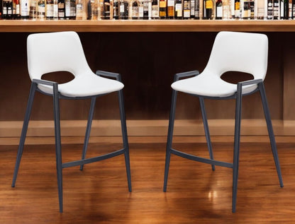 Set of Two 26" White and Black Faux Leather and Steel Low Back Counter Height Bar Chairs